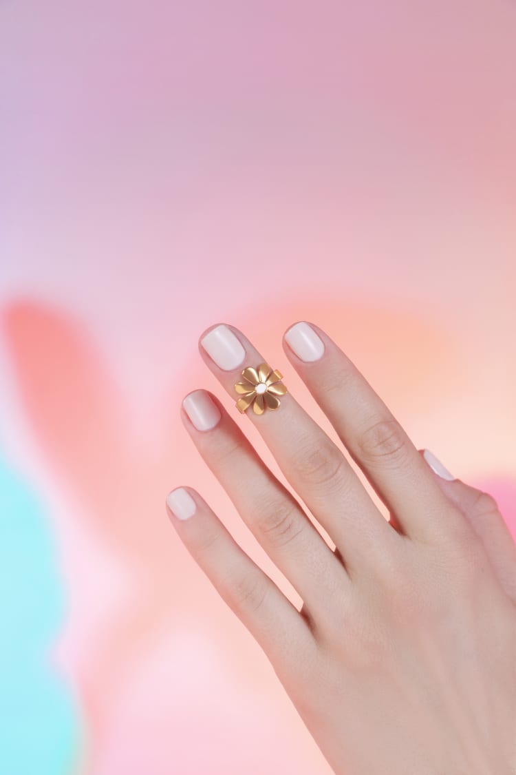 Bague midi fleur en or