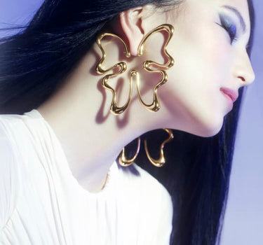 Grande boucle d’oreille papillon en or