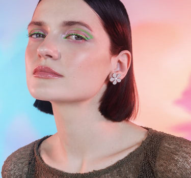 Puces d’oreilles marguerites en argent