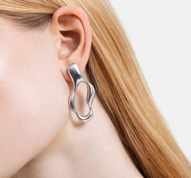 boucles d’oreilles créoles liquides en argent