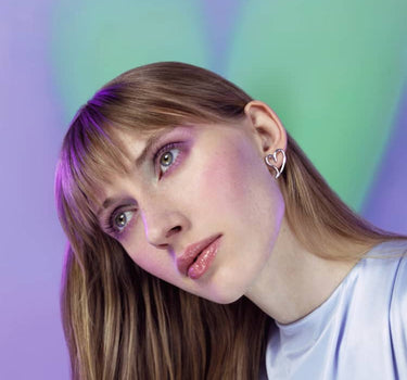 Clou d'oreille cœur ajouré en argent