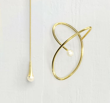 Ear cuff en or avec perle et chaîne