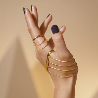 Gold wrap around ring set with chains