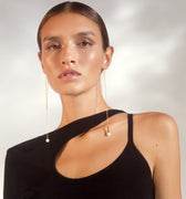 Long gold earrings with pearl