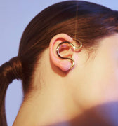 Gold snake ear cuff